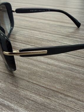Prada Black Frames with Gold Temple Accents